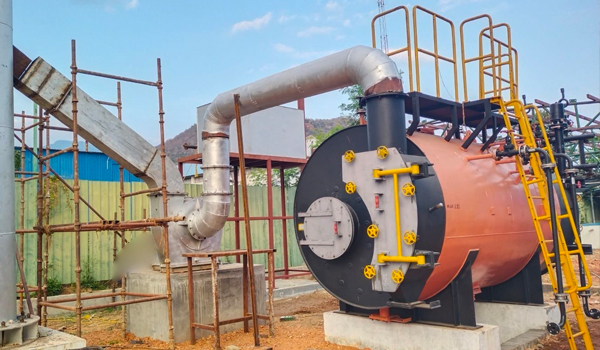 Fairtex technicians performing industrial boiler installation and maintenance in a utility plant