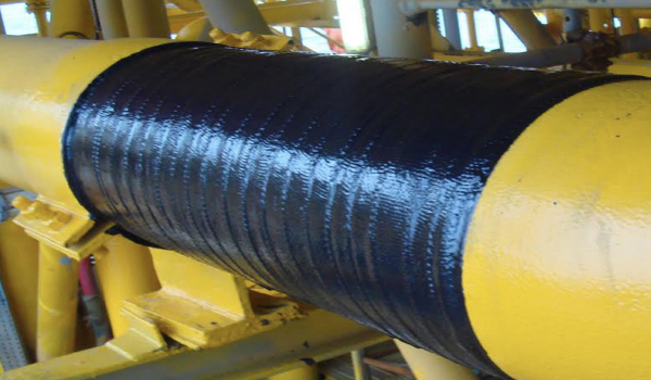 Composite pipeline repair wrap installation for structural reinforcement and leak sealing on industrial piping system
