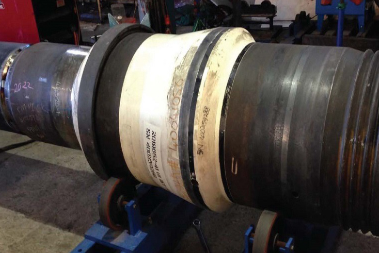 Offshore welding technicians performing conductor casing and wellhead fabrication activities