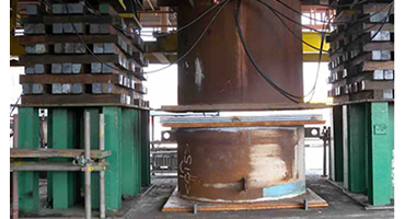 Hydraulic jacking system lifting a heavy industrial structure during transfer operation