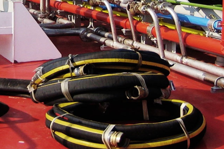 Industrial oil and petroleum transfer hose assembly for marine and refinery operations