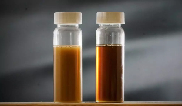 Industrial oil reclamation and vacuum dehydration skid connected to lubrication system equipment
