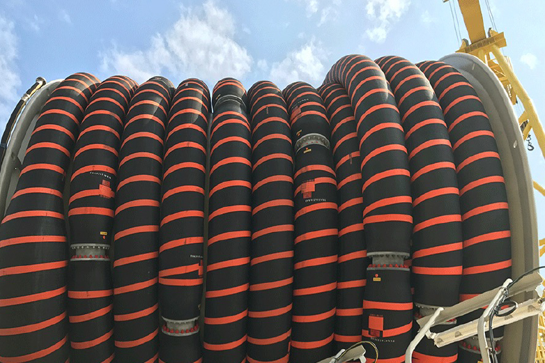 Offshore marine crude oil transfer hose system connected to FPSO loading and unloading operations