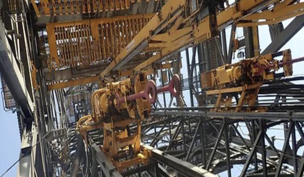 Inspection specialists conducting operational readiness survey on offshore drilling rig