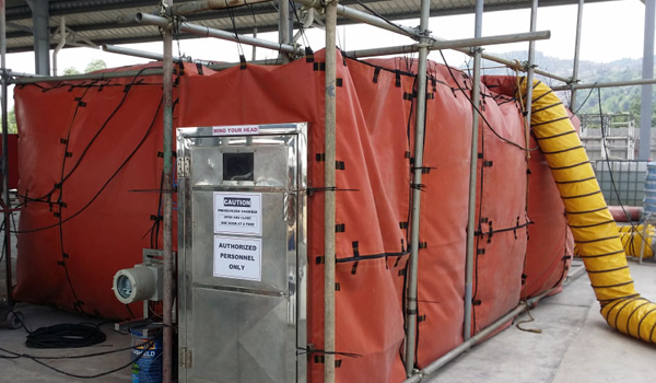 Pressurized safe welding habitat installed for hot work on an offshore oil and gas production facility