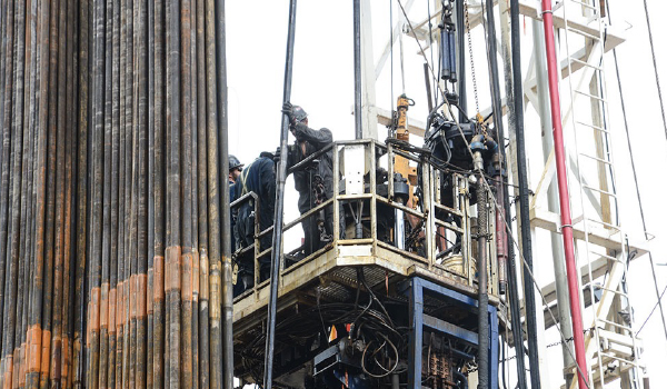 Well control specialists performing high-pressure intervention and well recovery operations