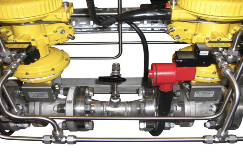 Heinzmann gas turbine fuel control and actuation system with integrated fuel metering, control valves, instrumentation, and turbine automation equipment.