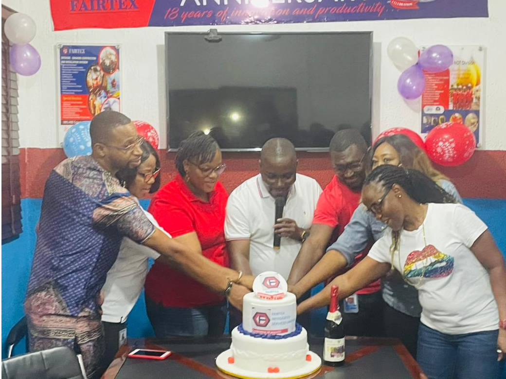 Fairtex staff and management during the 18th anniversary celebration at the Aba Road office facility